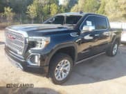 ✅ 2020 GMC Sierra 1500 Denali • VIN: 3GTU9FEL6LG453617 • Lot: 43517619. Listed on IAAI with 70,744 mi. Free auction sales archive from the USA and detailed vehicle history report at DreamBid. Image 2.