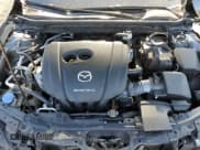 ✅ 2019 Mazda 3 Premium • VIN: JM1BPBNM4K1125558 • Лот: 70306565. Опубликован ранее на Copart с пробегом 48 060 миль. Бесплатный доступ к архиву аукционных продаж из США и подробный отчёт об истории автомобиля на DreamBid. Изображение 11.