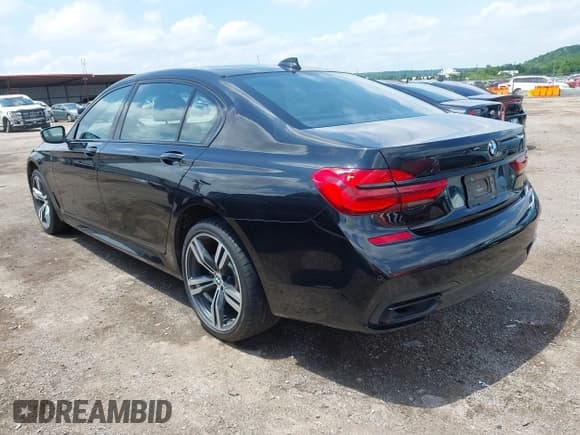 ✅ 2019 BMW 7 Series 740i • VIN: WBA7E2C5XKB217756 • Lot: 42509802. Listed on IAAI with 75,667 mi. Free auction sales archive from the USA and detailed vehicle history report at DreamBid. Image 3.