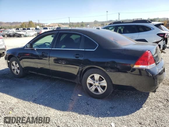 ✅ 2015 Chevrolet Impala LS • VIN: 2G1WA5E38F1108492 • Lot: 81808345. Listed on Copart with 164,849 mi. Free auction sales archive from the USA and detailed vehicle history report at DreamBid. Image 2.