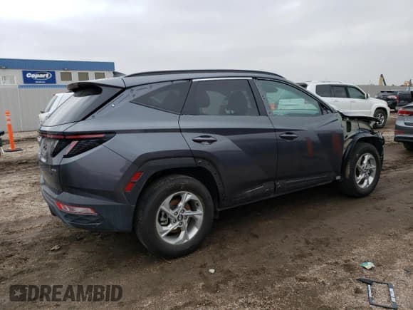✅ 2022 Hyundai Tucson Preferred • VIN: KM8JBCAE6NU033056 • Lot: 42577573. Wystawiony na Copart z przebiegiem 13 479 mil. Bezpłatny archiwum sprzedaży aukcyjnych z USA i szczegółowy raport historii pojazdu na DreamBid. Zdjęcie 3.