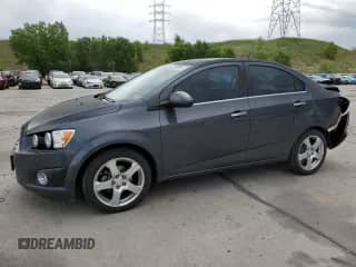 2013 Chevrolet Sonic LTZ с VIN 1G1JE5SH0D4102525, выставлен на аукционе Copart как лот 60976595 с пробегом 138 420 миль миль и Списание • Salvage title. История ставок и продаж доступна на DreamBid. Изображение 1.