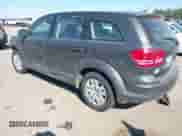 2015 Dodge Journey American Value z VIN 3C4PDCAB7FT559299, wystawiony jako IAAI lot #43409195 z przebiegiem 183 905 mil mil oraz . Historia ofert i sprzedaży dostępna na DreamBid. Obrazek 3.