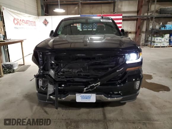 ✅ 2017 Chevrolet Silverado 1500 LT • VIN: 3GCUKREC4HG366828 • Лот: 82499825. Опубликован ранее на Copart с пробегом 140 698 миль. Бесплатный доступ к архиву аукционных продаж из США и подробный отчёт об истории автомобиля на DreamBid. Изображение 5.