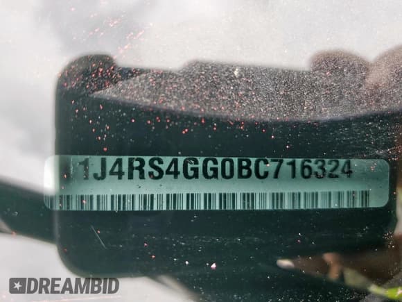 ✅ 2011 Jeep Grand Cherokee Laredo • VIN: 1J4RS4GG0BC716324 • Lot: 57833325. Listed on Copart with 162,902 mi. Free auction sales archive from the USA and detailed vehicle history report at DreamBid. Image 13.