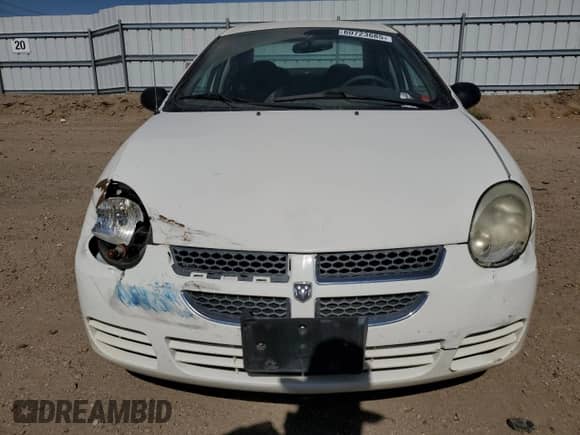 2004 Dodge Neon SXT z VIN 1B3ES56C24D630813, wystawiony jako Copart lot #60723685 z przebiegiem 69 856 mil mil oraz Szkoda całkowita • Salvage title. Historia ofert i sprzedaży dostępna na DreamBid. Obrazek 5.