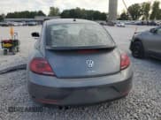 ✅ 2019 Volkswagen Beetle S • VIN: 3VWFD7AT0KM713901 • Лот: 71628455. Опубликован ранее на Copart с пробегом 10 084 миль. Бесплатный доступ к архиву аукционных продаж из США и подробный отчёт об истории автомобиля на DreamBid. Изображение 6.