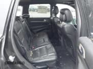 ✅ 2015 Jeep Grand Cherokee Overland • VIN: 1C4RJFCG3FC665854 • Lot: 41697999. Listed on IAAI with 206,618 mi. Free auction sales archive from the USA and detailed vehicle history report at DreamBid. Image 8.