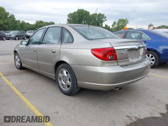 ✅ 2003 Saturn LS • VIN: 1G8JU54F23Y579397 • Lot: 43062943. Listed on IAAI with 184,144 mi. Free auction sales archive from the USA and detailed vehicle history report at DreamBid. Image 3.