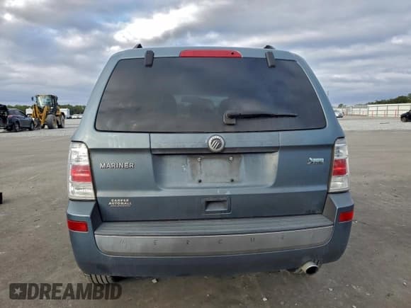 ✅ 2010 Mercury Mariner • VIN: 4M2CN8BG9AKJ07264 • Lot: 95537235. Listed on Copart with 241,448 mi. Free auction sales archive from the USA and detailed vehicle history report at DreamBid. Image 6.