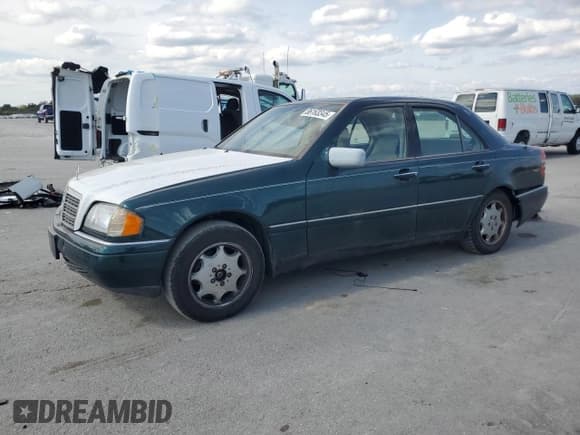 ✅ 1994 Mercedes-Benz C 2.8L • VIN: WDBHA28E5RF027599 • Лот: 86163345. Опубликован ранее на Copart с пробегом 295 024 миль. Бесплатный доступ к архиву аукционных продаж из США и подробный отчёт об истории автомобиля на DreamBid. Изображение 1.