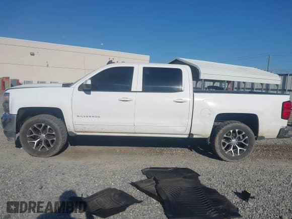 2016 Chevrolet Silverado 1500 LT z VIN 3GCPCREC5GG175539, wystawiony jako IAAI lot #43190681 z przebiegiem 138 000 mil mil oraz . Historia ofert i sprzedaży dostępna na DreamBid. Obrazek 14.