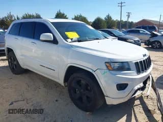 ✅ 2015 Jeep Grand Cherokee Laredo • VIN: 1C4RJEAG4FC166896 • Lot: 43562452. Wystawiony na IAAI z przebiegiem 128 456 mil. Bezpłatny archiwum sprzedaży aukcyjnych z USA i szczegółowy raport historii pojazdu na DreamBid. Zdjęcie 1.