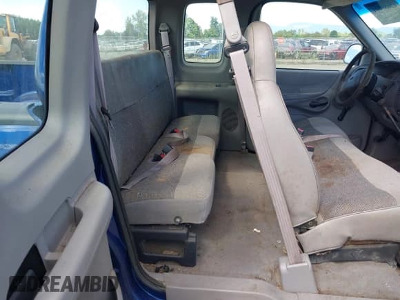 ✅ 1998 Ford F-150 • VIN: 2FTZX1727WCA77479 • Lot: 42685001. Listed on IAAI with 103,875 mi. Free auction sales archive from the USA and detailed vehicle history report at DreamBid. Image 8.