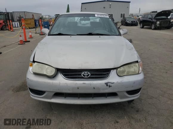 ✅ 2001 Toyota Corolla CE • VIN: 1NXBR12E21Z562307 • Lot: 82405645. Listed on Copart with 280,538 mi. Free auction sales archive from the USA and detailed vehicle history report at DreamBid. Image 5.