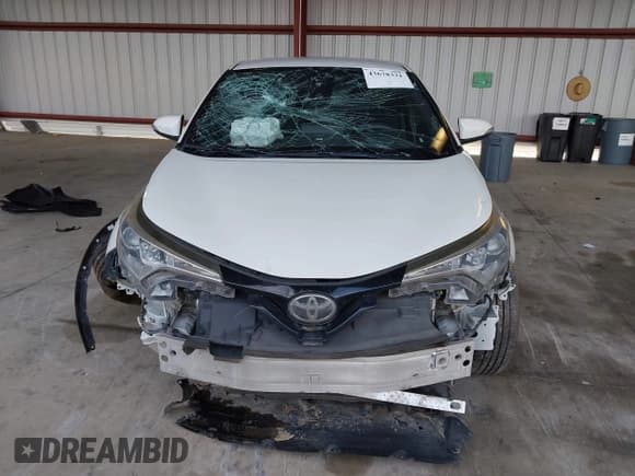 ✅ 2019 Toyota C-HR LE • VIN: NMTKHMBX4KR099486 • Lot: 43678331. Listed on IAAI with 299,670 mi. Free auction sales archive from the USA and detailed vehicle history report at DreamBid. Image 13.