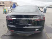 ✅ 2015 Tesla Model S 85 • VIN: 5YJSA1E16FF107254 • Lot: 43741109. Listed on IAAI with 119,933 mi. Free auction sales archive from the USA and detailed vehicle history report at DreamBid. Image 17.