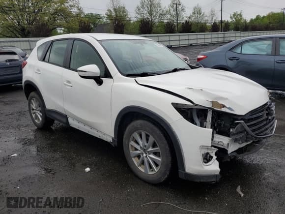 ✅ 2016 Mazda CX-5 Sport • VIN: JM3KE4BY2G0802376 • Lot: 55976585. Listed on Copart with 112,600 mi. Free auction sales archive from the USA and detailed vehicle history report at DreamBid. Image 4.