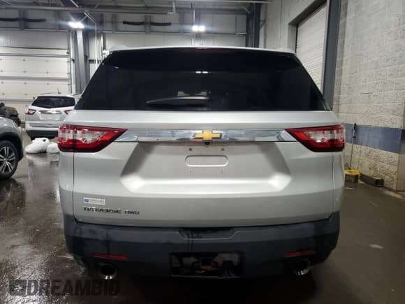 2018 Chevrolet Traverse LS z VIN 1GNEVFKW4JJ201138, wystawiony jako Copart lot #68176555 z przebiegiem 190 825 mil mil oraz Szkoda całkowita • Salvage title. Historia ofert i sprzedaży dostępna na DreamBid. Obrazek 6.