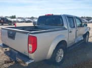 ✅ 2018 Nissan Frontier Desert Runner • VIN: 1N6DD0ER0JN732126 • Lot: 43485055. Listed on IAAI with 86,056 mi. Free auction sales archive from the USA and detailed vehicle history report at DreamBid. Image 4.