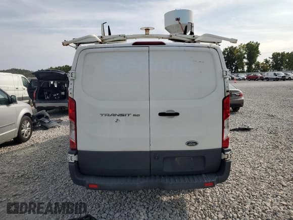 ✅ 2015 Ford Transit Cargo • VIN: 1FTNE1ZM4FKA17240 • Lot: 71626675. Listed on Copart with 199,693 mi. Free auction sales archive from the USA and detailed vehicle history report at DreamBid. Image 6.