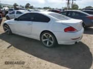 ✅ 2009 BMW 6 Series 650i • VIN: WBAEA53529CV92274 • Лот: 52762835. Опубликован ранее на Copart с пробегом 155 165 миль. Бесплатный доступ к архиву аукционных продаж из США и подробный отчёт об истории автомобиля на DreamBid. Изображение 2.
