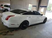 ✅ 2013 Jaguar XJ • VIN: SAJWA1C78D8V41974 • Лот: 54256685. Опубликован ранее на Copart с пробегом 107 499 миль. Бесплатный доступ к архиву аукционных продаж из США и подробный отчёт об истории автомобиля на DreamBid. Изображение 3.