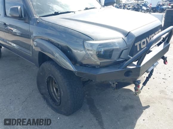 ✅ 2012 Toyota Tacoma • VIN: 5TFLU4EN5CX037912 • Lot: 41691626. Listed on IAAI with 164,265 mi. Free auction sales archive from the USA and detailed vehicle history report at DreamBid. Image 6.