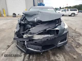 ✅ 2014 Cadillac CTS Luxury AWD • VIN: 1G6AX5SX9E0121675 • Лот: 70039225. Опубликован ранее на Copart с пробегом 141 595 миль. Бесплатный доступ к архиву аукционных продаж из США и подробный отчёт об истории автомобиля на DreamBid. Изображение 5.