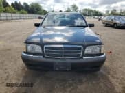 ✅ 2000 Mercedes-Benz C 230/260/280/320 • VIN: WDBHA29G4YA848172 • Лот: 64968985. Опубликован ранее на Copart с пробегом Не указан. Бесплатный доступ к архиву аукционных продаж из США и подробный отчёт об истории автомобиля на DreamBid. Изображение 5.