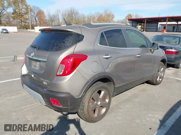 ✅ 2013 Buick Encore Leather • VIN: KL4CJCSBXDB124002 • Lot: 43723515. Listed on IAAI with 158,182 mi. Free auction sales archive from the USA and detailed vehicle history report at DreamBid. Image 4.