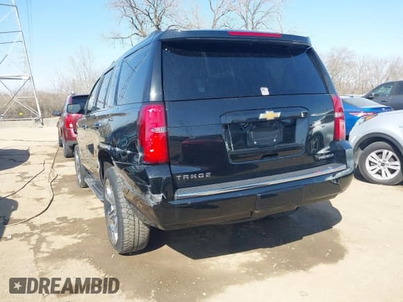 ✅ 2019 Chevrolet Tahoe Premier • VIN: 1GNSKCKC4KR125987 • Lot: 41756961. Listed on IAAI with 125,804 mi. Free auction sales archive from the USA and detailed vehicle history report at DreamBid. Image 3.