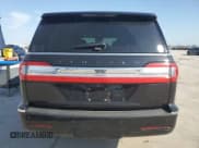✅ 2021 Lincoln Navigator Black Label • VIN: 5LMJJ3TT3MEL17149 • Лот: 56899515. Опубликован ранее на Copart с пробегом 50 272 миль. Бесплатный доступ к архиву аукционных продаж из США и подробный отчёт об истории автомобиля на DreamBid. Изображение 6.