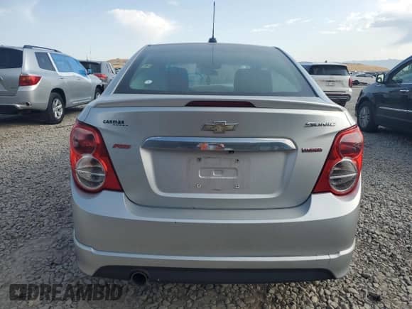 2015 Chevrolet Sonic RS с VIN 1G1JG5SB7F4168806, выставлен на аукционе Copart как лот 59898885 с пробегом 86 826 миль миль и Списание • Salvage title. История ставок и продаж доступна на DreamBid. Изображение 6.