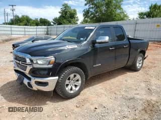 2020 Ram 1500 Laramie with VIN 1C6RREDT0LN265191, listed as a Copart auction lot 57207775 with 124,269 mi miles and Salvage title. Bid and sale history available at DreamBid. Image 1.