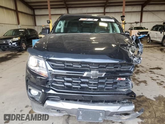 ✅ 2022 Chevrolet Colorado 4WD Z71 • VIN: 1GCGTDENXN1293571 • Лот: 67929225. Опубликован ранее на Copart с пробегом 51 704 миль. Бесплатный доступ к архиву аукционных продаж из США и подробный отчёт об истории автомобиля на DreamBid. Изображение 5.