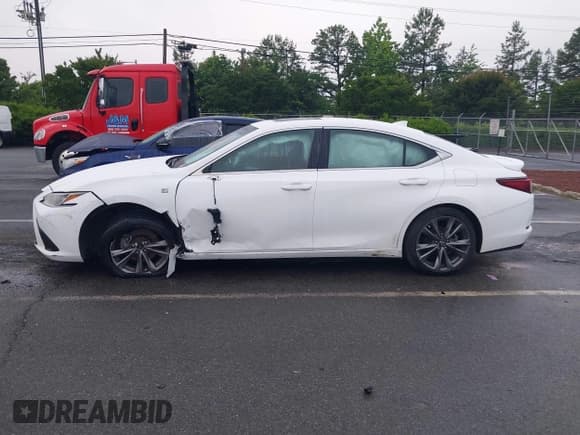 ✅ 2020 Lexus ES 350 F Sport • VIN: 58AGZ1B19LU053023 • Lot: 42196802. Wystawiony na IAAI z przebiegiem 100 306 mil. Bezpłatny archiwum sprzedaży aukcyjnych z USA i szczegółowy raport historii pojazdu na DreamBid. Zdjęcie 14.