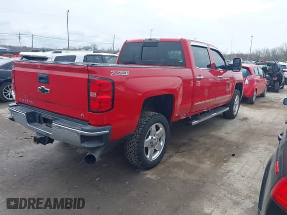 ✅ 2015 Chevrolet Silverado 2500HD LTZ • VIN: 1GC1KWE83FF616085 • Lot: 41987956. Listed on IAAI with 72,950 mi. Free auction sales archive from the USA and detailed vehicle history report at DreamBid. Image 4.