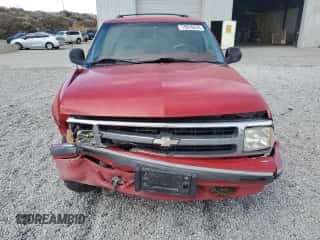 1996 Chevrolet Blazer z VIN 1GNDT13W7T2138892, wystawiony jako Copart lot #79970274 z przebiegiem 192 084 mil mil oraz Szkoda całkowita • Salvage title. Historia ofert i sprzedaży dostępna na DreamBid. Obrazek 5.