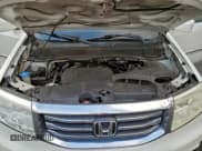 ✅ 2013 Honda Pilot Touring • VIN: 5FNYF4H95DB059001 • Lot: 96227875. Listed on Copart with 184,556 mi. Free auction sales archive from the USA and detailed vehicle history report at DreamBid. Image 12.