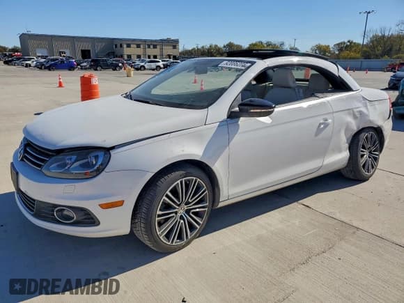 ✅ 2014 Volkswagen Eos Komfort • VIN: WVWBW8AH7EV005457 • Лот: 92086205. Опубликован ранее на Copart с пробегом 71 138 миль. Бесплатный доступ к архиву аукционных продаж из США и подробный отчёт об истории автомобиля на DreamBid. Изображение 1.