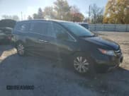 ✅ 2014 Honda Odyssey EX-L • VIN: 5FNRL5H64EB026422 • Lot: 91562965. Listed on Copart with 195,040 mi. Free auction sales archive from the USA and detailed vehicle history report at DreamBid. Image 4.