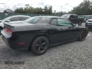 2013 Dodge Challenger SXT z VIN 2C3CDYAG5DH569623, wystawiony jako Copart lot #69090204 z przebiegiem 178 646 mil mil oraz Szkoda całkowita • Salvage title. Historia ofert i sprzedaży dostępna na DreamBid. Obrazek 3.