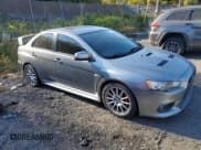 ✅ 2014 Mitsubishi Lancer Evolution GSR • VIN: JA32W8FV6EU018171 • Lot: 77109934. Listed on Copart with 83,467 mi. Free auction sales archive from the USA and detailed vehicle history report at DreamBid. Image 4.