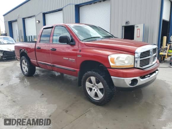 2006 Dodge 1500 Laramie z VIN 1D7HU18216S573270, wystawiony jako Copart lot #62885405 z przebiegiem 199 766 mil mil oraz Szkoda całkowita • Salvage title. Historia ofert i sprzedaży dostępna na DreamBid. Obrazek 4.