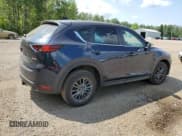 ✅ 2021 Mazda CX-5 Touring • VIN: JM3KFACM7M0113548 • Лот: 66671995. Опубликован ранее на Copart с пробегом 75 399 миль. Бесплатный доступ к архиву аукционных продаж из США и подробный отчёт об истории автомобиля на DreamBid. Изображение 3.