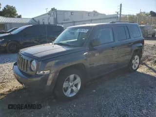 ✅ 2015 Jeep Patriot Latitude • VIN: 1C4NJPFA2FD397885 • Lot: 90947475. Listed on Copart with 155,880 mi. Free auction sales archive from the USA and detailed vehicle history report at DreamBid. Image 1.