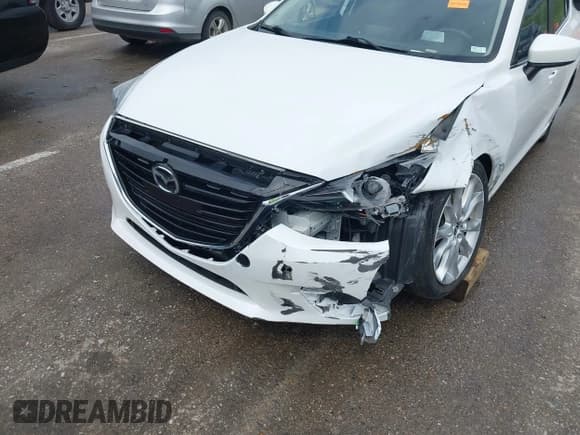 ✅ 2014 Mazda 3 S Touring • VIN: JM1BM1V36E1111496 • Лот: 42427752. Опубликован ранее на IAAI с пробегом 132 211 миль. Бесплатный доступ к архиву аукционных продаж из США и подробный отчёт об истории автомобиля на DreamBid. Изображение 6.
