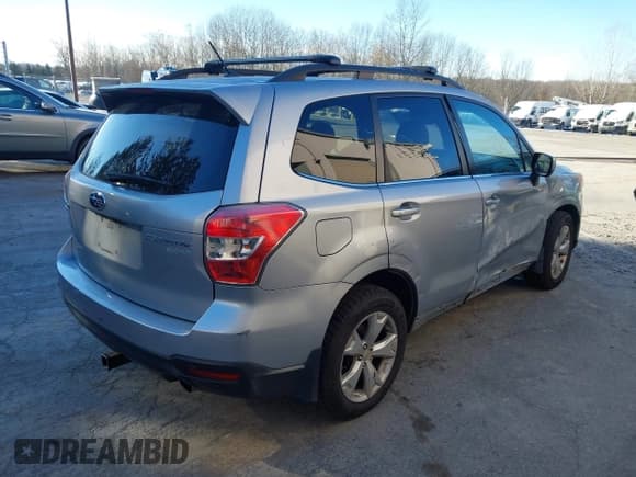 ✅ 2014 Subaru Forester Limited • VIN: JF2SJAHC5EH443748 • Lot: 43853197. Listed on IAAI with 127,520 mi. Free auction sales archive from the USA and detailed vehicle history report at DreamBid. Image 4.