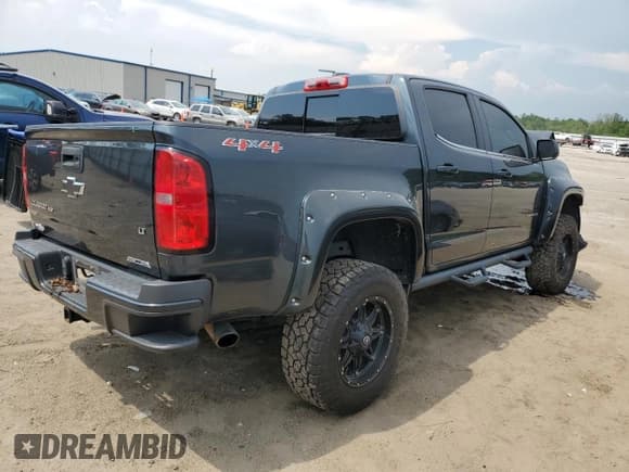 ✅ 2018 Chevrolet Colorado 4WD LT • VIN: 1GCGTCEN4J1245021 • Лот: 63141524. Опубликован ранее на Copart с пробегом 90 784 миль. Бесплатный доступ к архиву аукционных продаж из США и подробный отчёт об истории автомобиля на DreamBid. Изображение 3.